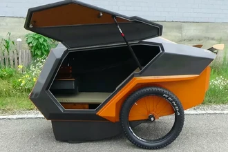 Лёгкий прицеп для электровелосипеда: мобильный дом для путешествий